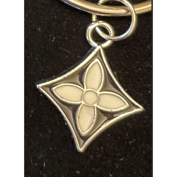 Silver Hoop Earrings with Black and White Flower Charms - Picture 3 of 4